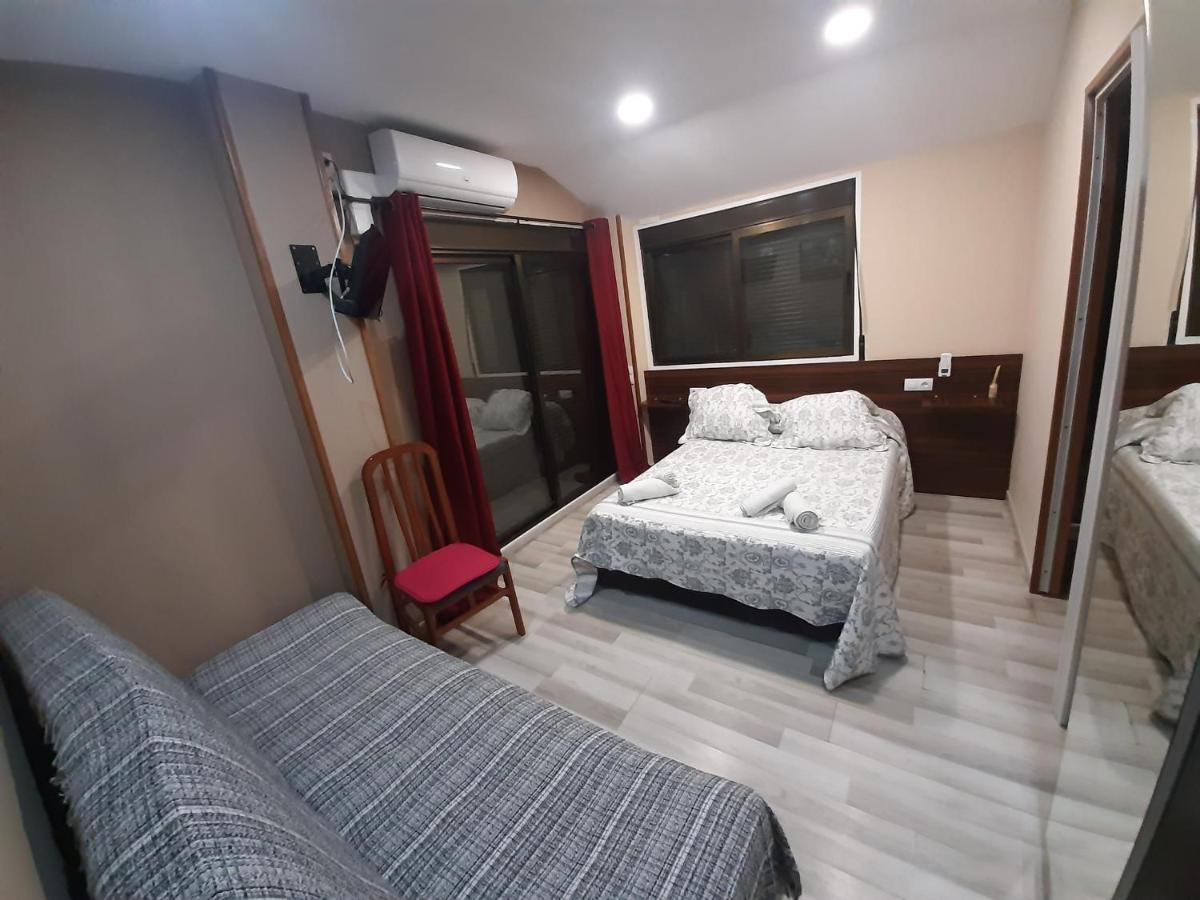 Hostal Escarla Aren Bagian luar foto